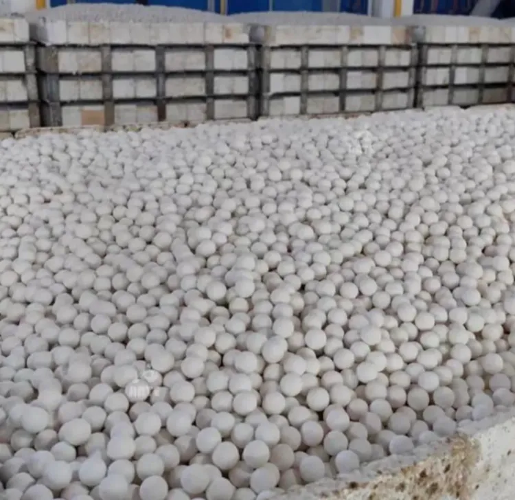 Inert alumina ceramic balls inventory stored for industrial filtration and catalyst support